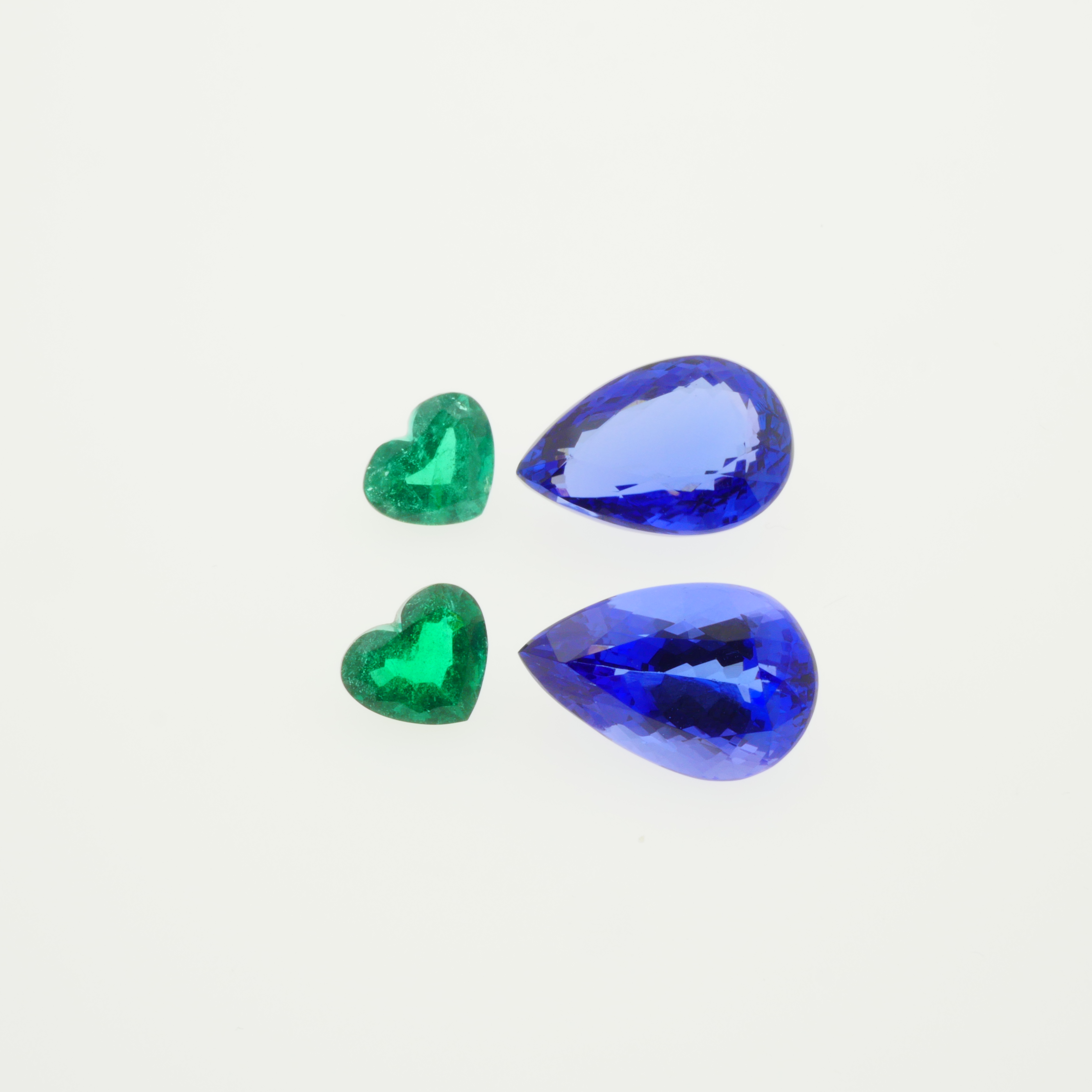 pear cut tanzanites and heart shape emeralds